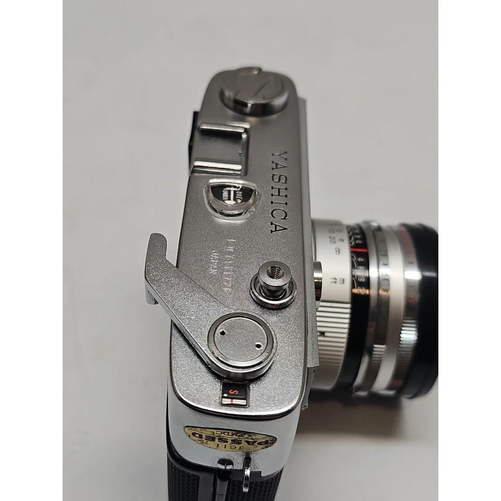 Yashica Lynx 5000 35mm Rangefinder Film Camera.  45mm f/1.8 Lens. W/ Casing